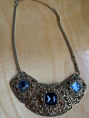 Gold Filigree Necklace with Blue Gemstone Accents
